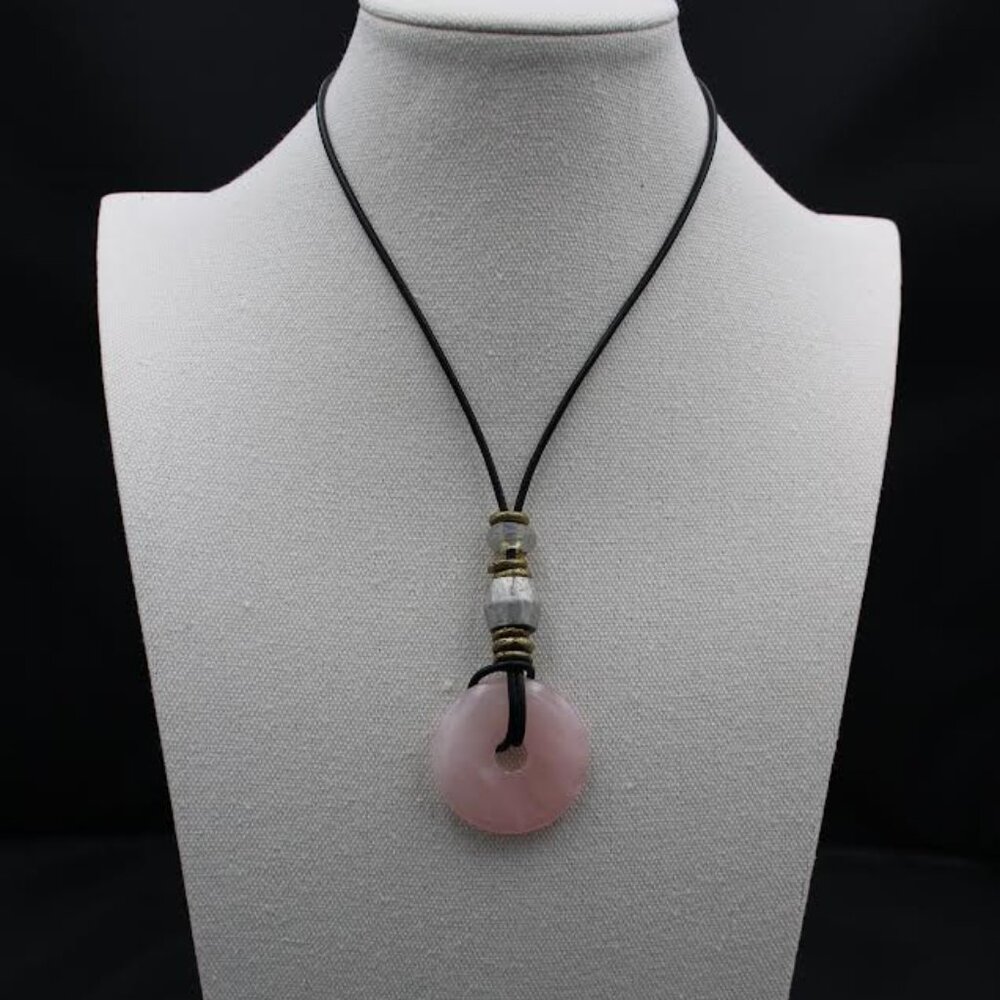 Stepen J Sotnick design. Women's necklace, Rose Quartz 22" pendant on leather.